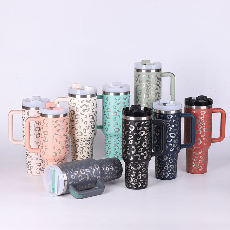 STANLEY Quencher H2.0 Tumbler with Handle and Straw 30 oz | Flowstate 3-Position Lid | Cup Holder Compatible for Travel | Insulated Stainless Steel Cup | BPA-Free | Nectarine