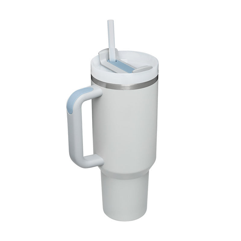 STANLEY Quencher H2.0 Tumbler with Handle and Straw 30 oz | Flowstate 3-Position Lid | Cup Holder Compatible for Travel | Insulated Stainless Steel Cup | BPA-Free | Nectarine